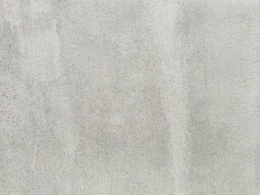 Eski beton duvarın dokusu. Açık gri çimento desenli beton duvar. Gri pastel, sert, çatallı çimento, beton, taş, sıva, alçıdan duvar. Boyanmış arka plan..