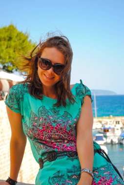 Lovely girl posing on shore