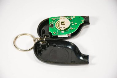 Bir anahtarlık şeklinde lastik basıncı ölçmek için küçük bir basınç göstergesi.