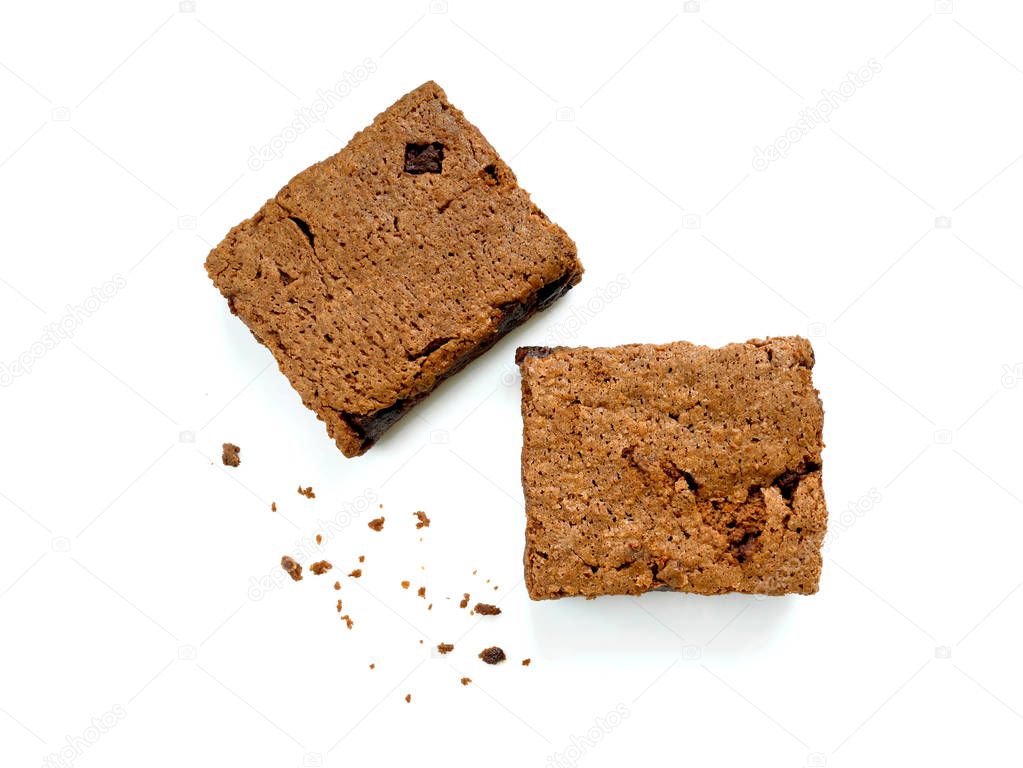 Brownies with crumbs isolated on white background. Top view.