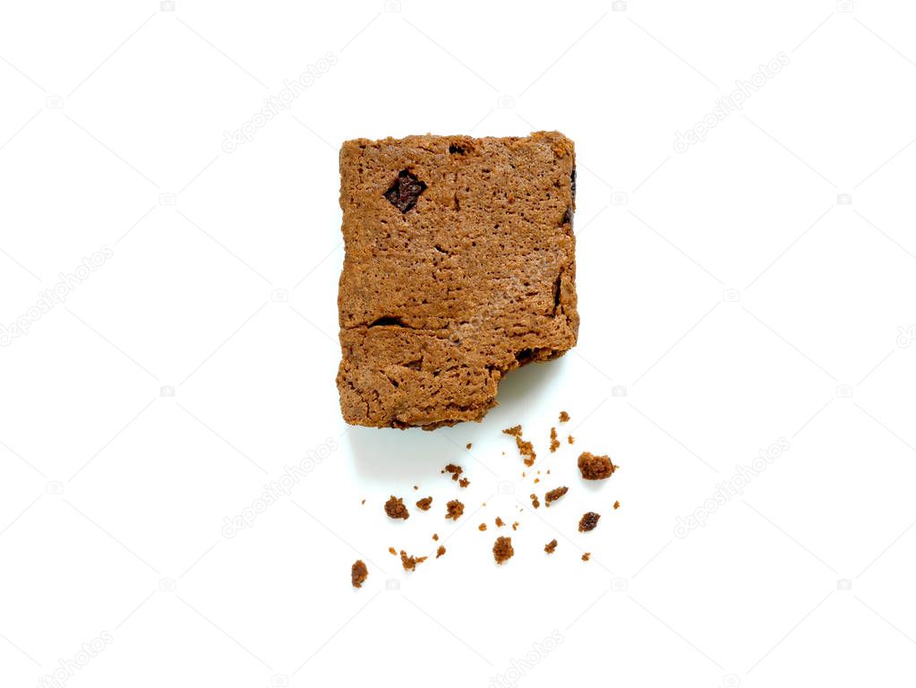 Brownie with crumbs isolated on white background. Top view.