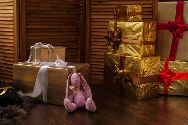 many gifts are beautifully packaged in Golden tones.