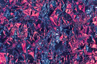 Holografik gökkuşağı metal folyo. Gerçek hologram buruşuk arka plan soyut folyo 80s doku ile birden fazla colors.purple doku arka plan bulanıklık, kaleydoskop değil net bir görüntü