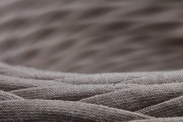 Gri örme iplik yakın çekim skein. Makro fotoğraf arka plan doku deseninin örgü kumaş Tekstil