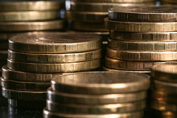 money stacks metal coins closeup. selective focus