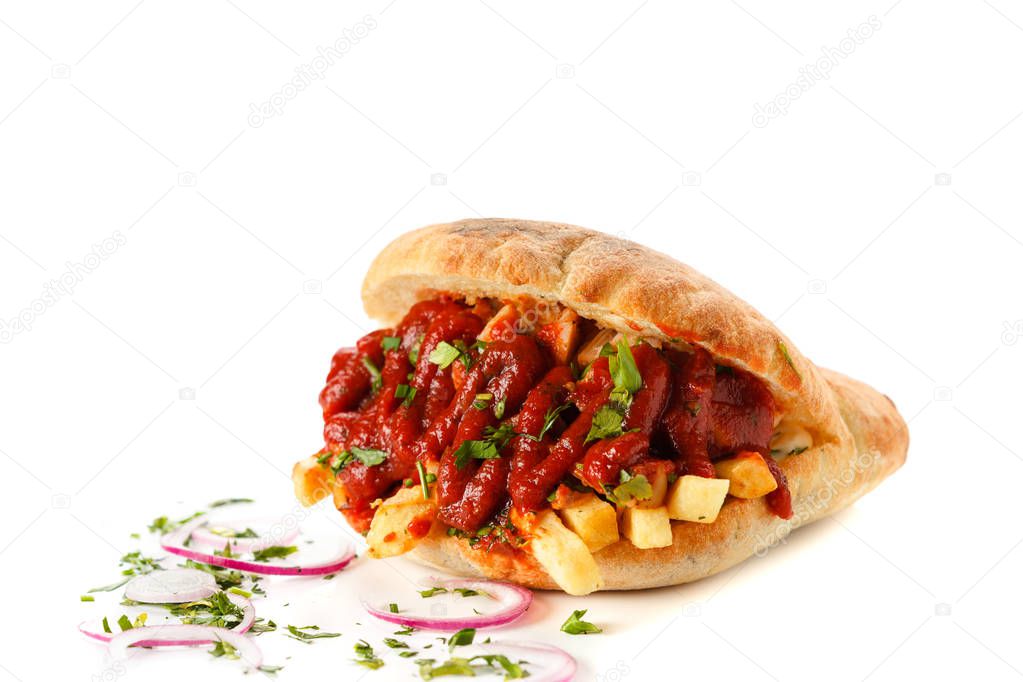 fast food French fries with meat filled with ketchup in a bun wi