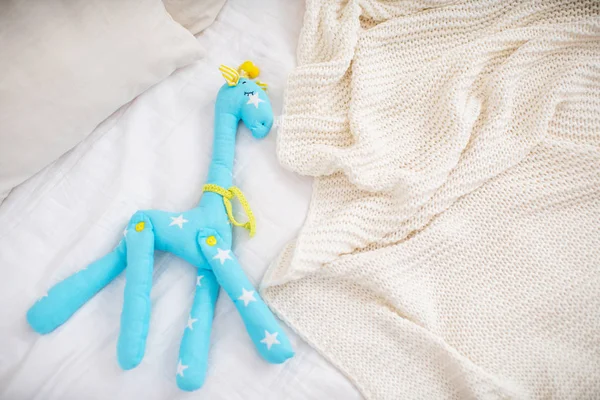 toy giraffe, sewn and handmade fabrics.