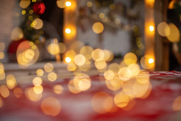 Defocused bokeh lights, holiday lights and Christmas mood. Yellow-orange bokeh festival. Abstract Christmas background