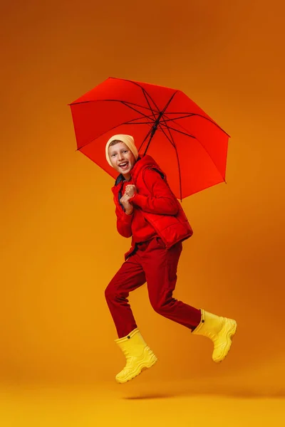 Emotional Funny Boy Teenager Jumping Srowing Autumn Clothes Red Umbrella — 스톡 사진