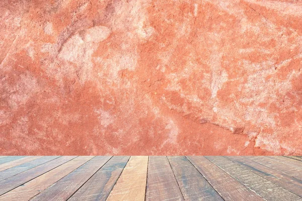 オレンジ色の壁と空の木製デスク テキストと画像の空白 — ストック写真