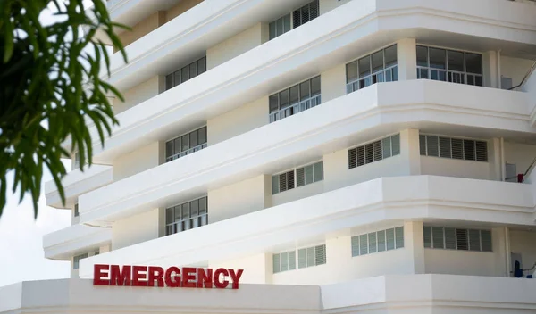 Modern public hospital white building, Emergency Room Entrance .