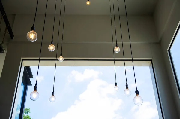 Modern hanging lamp on the ceiling, background .