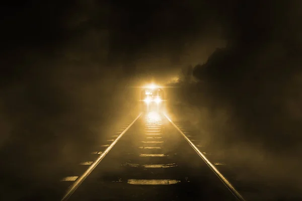 Old trains run through at night on sky cloud storm background
