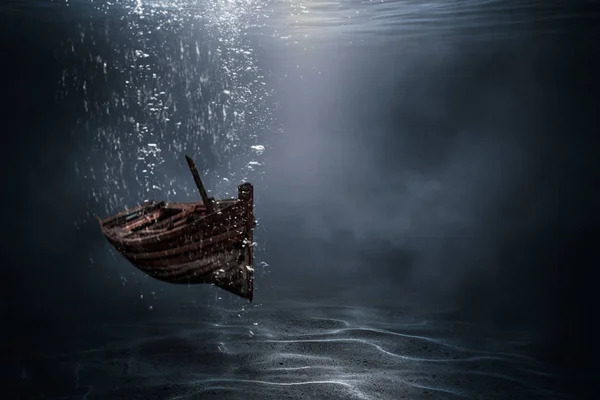 Wooden boats are sinking under the sea.