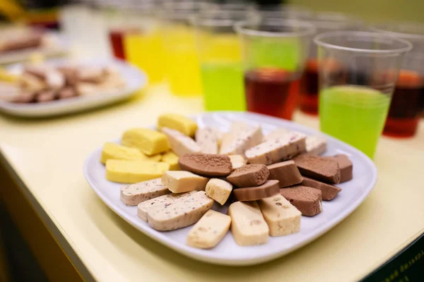 Protein bar on the plate, snacks for athletes in the fitness club