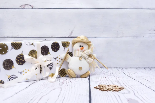 White Gift Box White Bow Toy Snowman Snowflake White Wooden — Stock Photo, Image