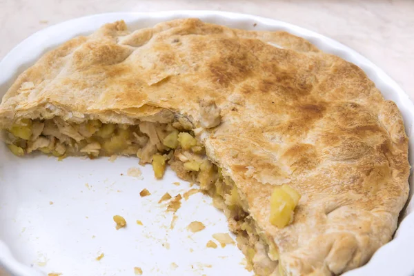 puff pastry pie with chicken and potatoes, food
