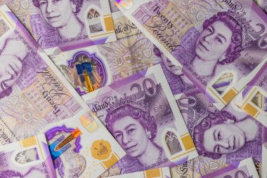 İngiliz 20 sterlinlik banknot yığını makro çekim, finans, tasarruf, yatırım ve iş geçmişi kavramı.