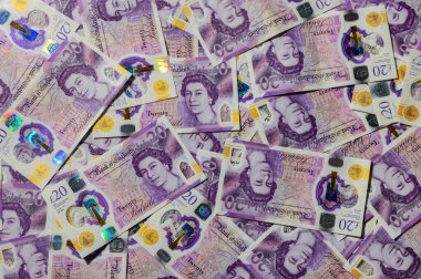 İngiliz para birimini ayrıntılı olarak gösteren, finans, tasarruf, iş ve İngiltere ekonomisini sembolize eden 20 banknot..