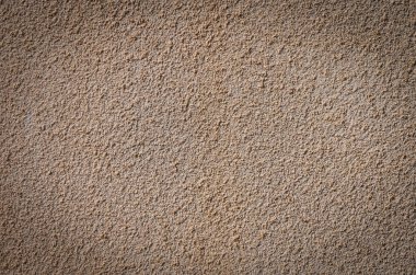 Kıbrıs Rum Kesimi 'nin sıva duvar dokusunun yakın çekimi. Mimari tasarım, seyahat, dekorasyon ve yaratıcı kullanım için Akdeniz kırsal tarzı yüzeyi mükemmeldir.