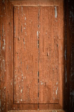 Eski bir ahşap kapı parçasına yakın plan boyalı. Eski moda, tasarım veya dekoratif projeler için biçilmiş kaftan