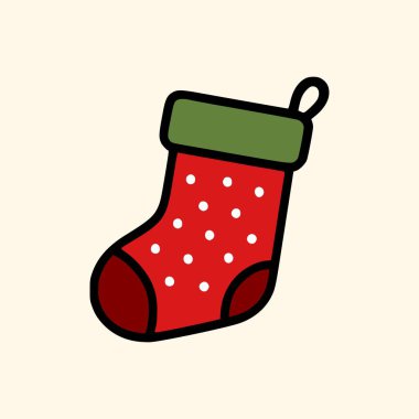 Yeşil bluzlu geleneksel kırmızı Noel çorabı ve bej arka planda izole edilmiş benekli kış tatili süslemesi.