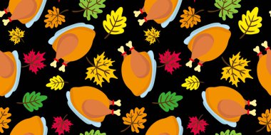 Canlı şükran günü ziyafeti, közlenmiş hindi ve siyah arka planda renkli sonbahar yapraklarıyla kusursuz desenli sonbahar yemeği.