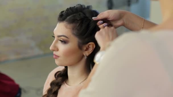 Hairdresser Making Big Braid For Client In Salon Weaving Braids