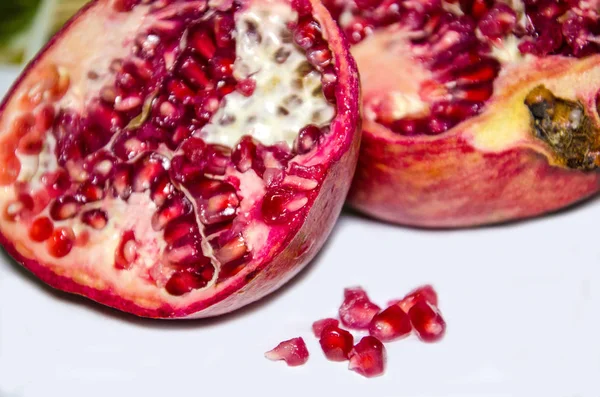 pomegranate, pomegranate fruit, cutting pomegranate fruit on white background,