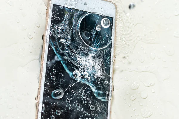 Phone in the water. Concept broken phone. Smartphone repair concept — Stock Photo, Image