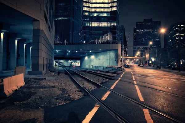 Dark urban downtown city train tunnel at night