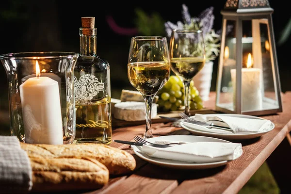 Romantic Dinner Two Glasses Wine Baguette Snacks Old Wooden Table Stock Image