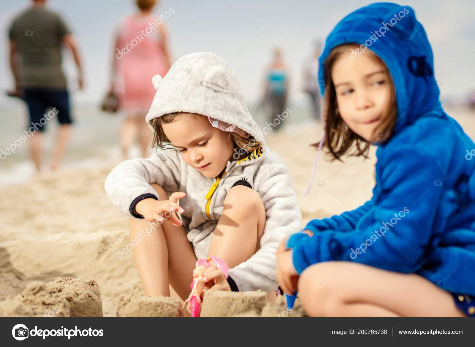 girls play dolls
