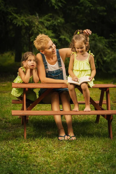 Beautiful Mother Two Adorable Daughters Dresses Posing Picnic Table Summer — Stock Photo, Image