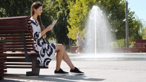 Young Business Woman Dress Sitting Bench Works Tablet Summer — Stock Video