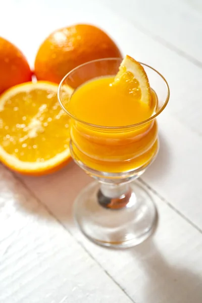 Glass Freshly Made Orange Juice Fruits White Wooden Table — Stock Photo, Image