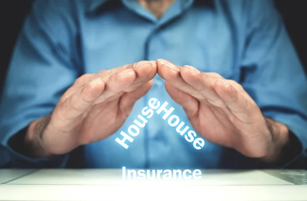 Man protect house insurance words. Real estate concept