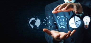 Küre, saat, kumbara, pasta grafik ve ampul tutan adam. İş kavramı