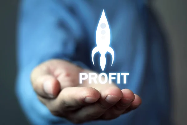 Man holding profit rocket. Business concept