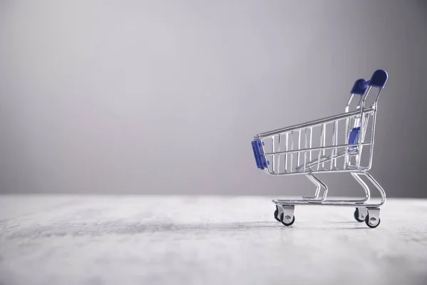 Shopping cart on the desk. Business