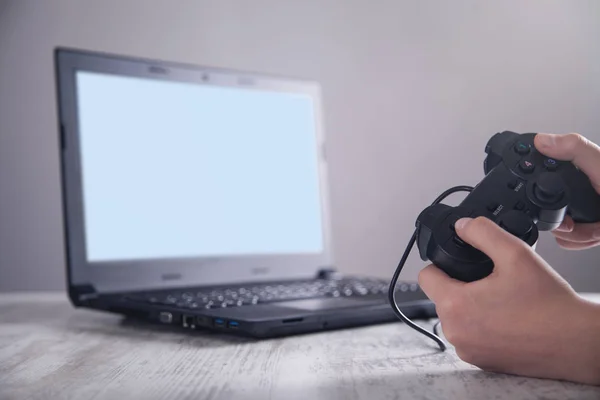 Hands using game controller. Playing video games — Stock Photo, Image