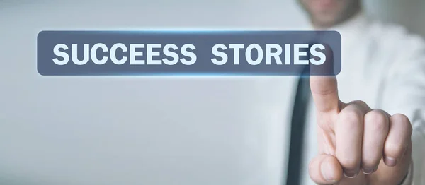 Man hand press Success Stories text in screen.