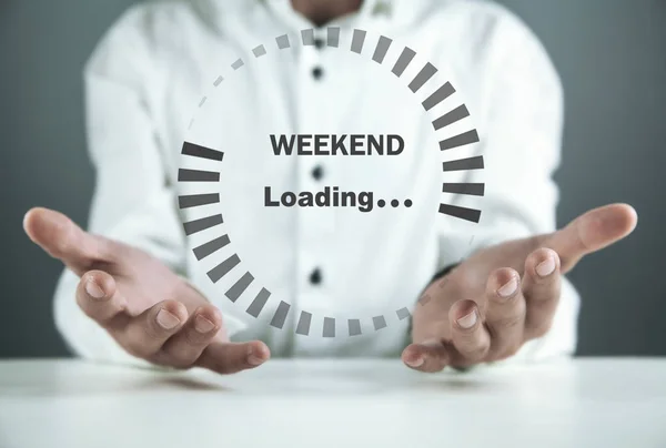 Man holding loading icon. Weekend loading concept
