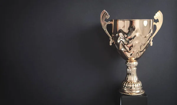 Golden trophy on black background. Business, Success — Stock Photo, Image
