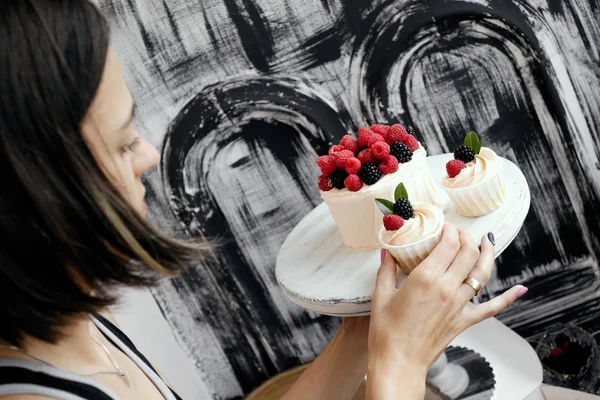 Woman Decorating Delicious Cake — Stock Photo, Image