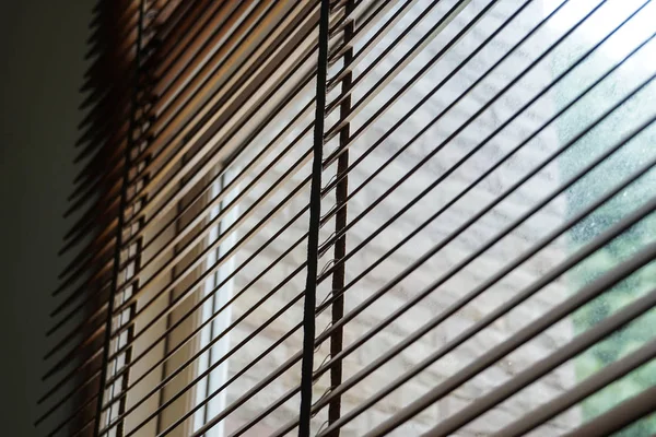 wood blind shade curtain and shadow tree background