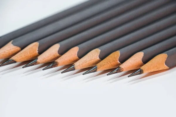 Sharp Grey Pencils White Table Background — Stock Photo, Image