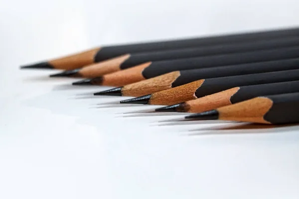 Sharp Grey Pencils White Table Background — Stock Photo, Image