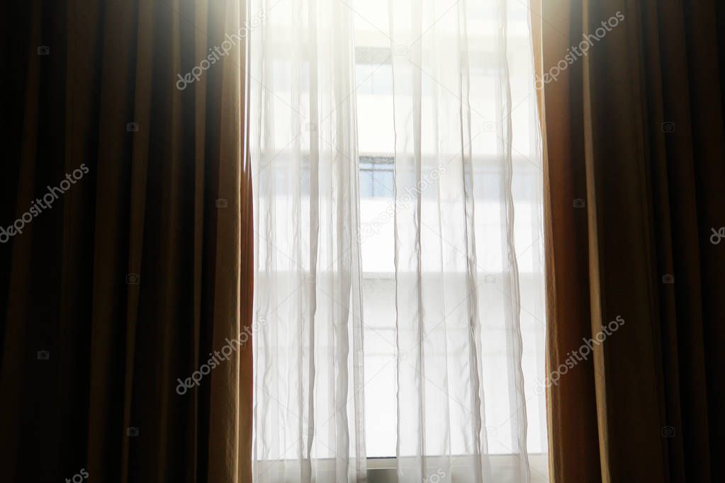 brown white hospital curtain sunlight