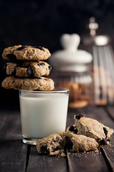 Glass Milk Cookies Raisins Wooden Table Cookie Containers Black Background — Stock Photo, Image